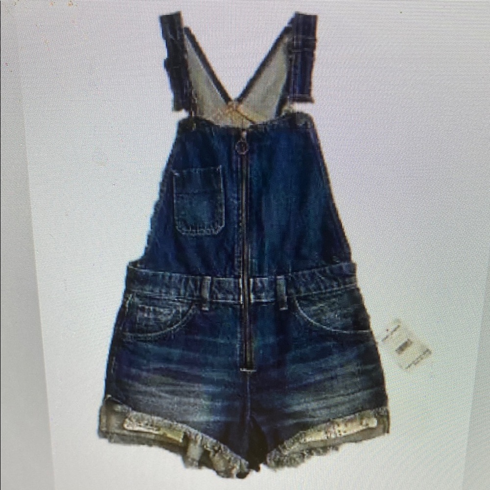 NWOT MSRP $118. We the Free People Denim Overalls